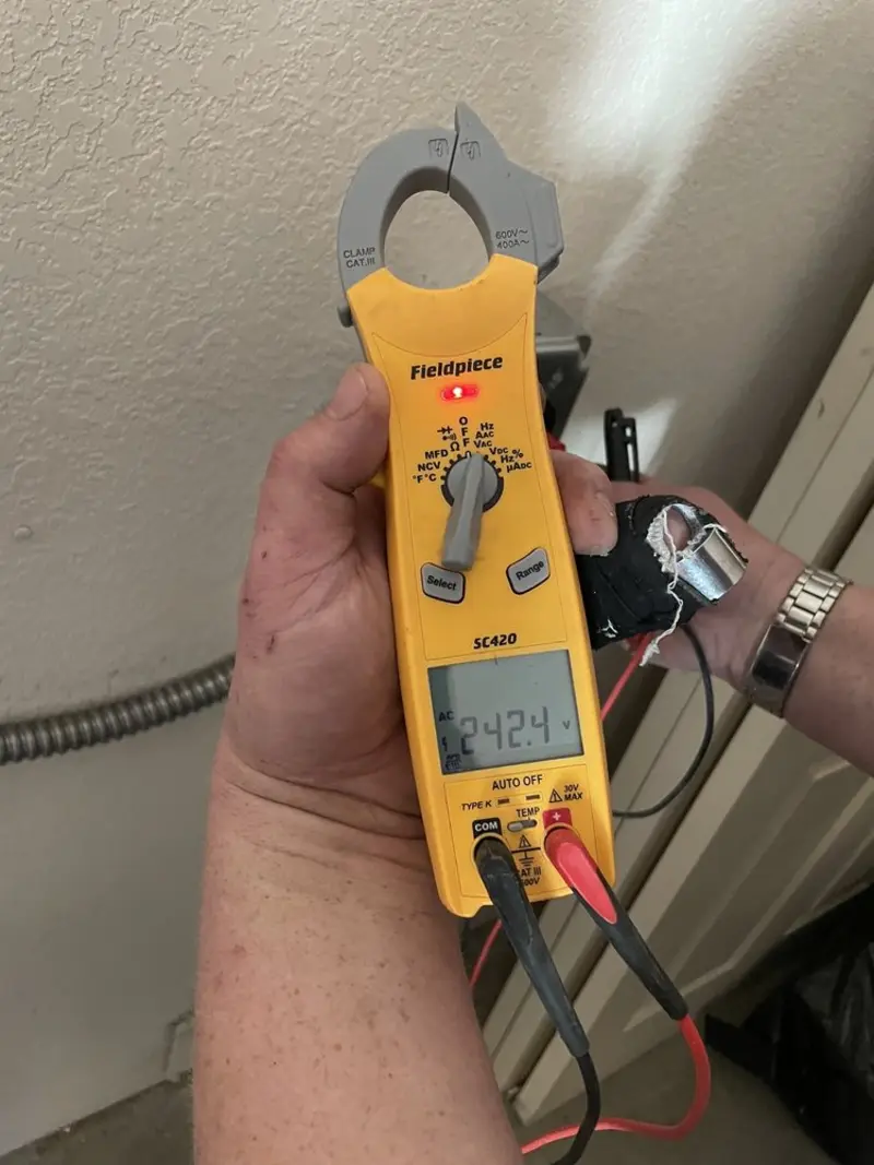 Voltage testing with clamp meter during Hot Tub / Pool Electrical Wiring in Waterford